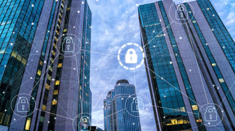 Skyscrapers with digital lock icons and network overlay, representing secure business environments and cybersecurity.